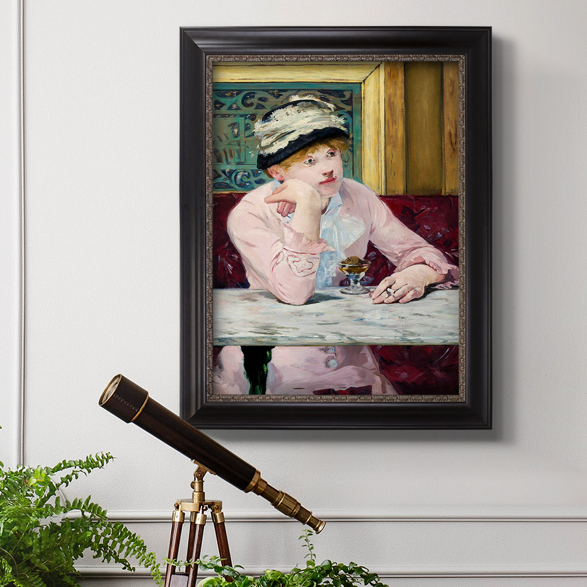 Impressionist portrait scene with plum brandy by Édouard Manet in an ornate black frame with gilded inner detail displayed in a light-toned interior setting.