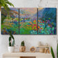 Three-panel canvas wall art featuring embracing landscape with warm tones, displayed in a boho-chic entryway above a console table.
