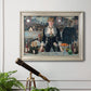 Iconic impressionist café bar scene by Édouard Manet in an ornate champagne frame displayed in a light-toned interior setting.