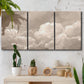 Three-panel canvas wall art featuring soft whimsical cloudscape, displayed in a boho-chic entryway above a console table.