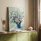 Canvas art print of a floral arrangement with loose brushwork and gentle tones styled in a home decor setting.