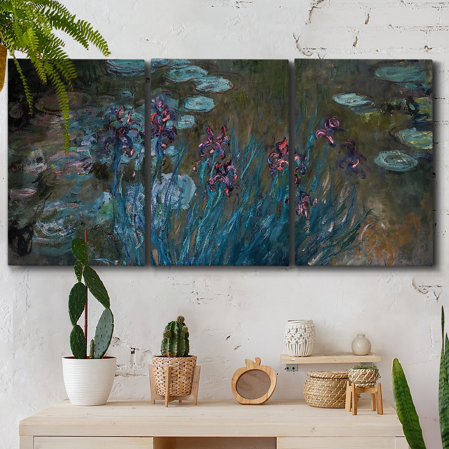 Three-panel canvas wall art featuring water lilies on reflective pond, displayed in a boho-chic entryway above a console table.