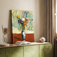 Canvas art print of a floral arrangement with bold tones and patterned container styled in a home decor setting.