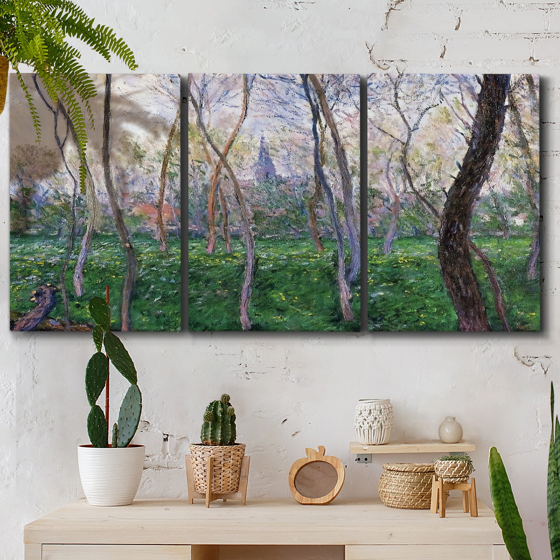 Three-panel canvas wall art featuring spring landscape along river, displayed in a boho-chic entryway above a console table.