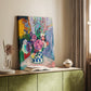 Canvas art print of a bright floral arrangement with layered petals and bold tones styled in a home decor setting.