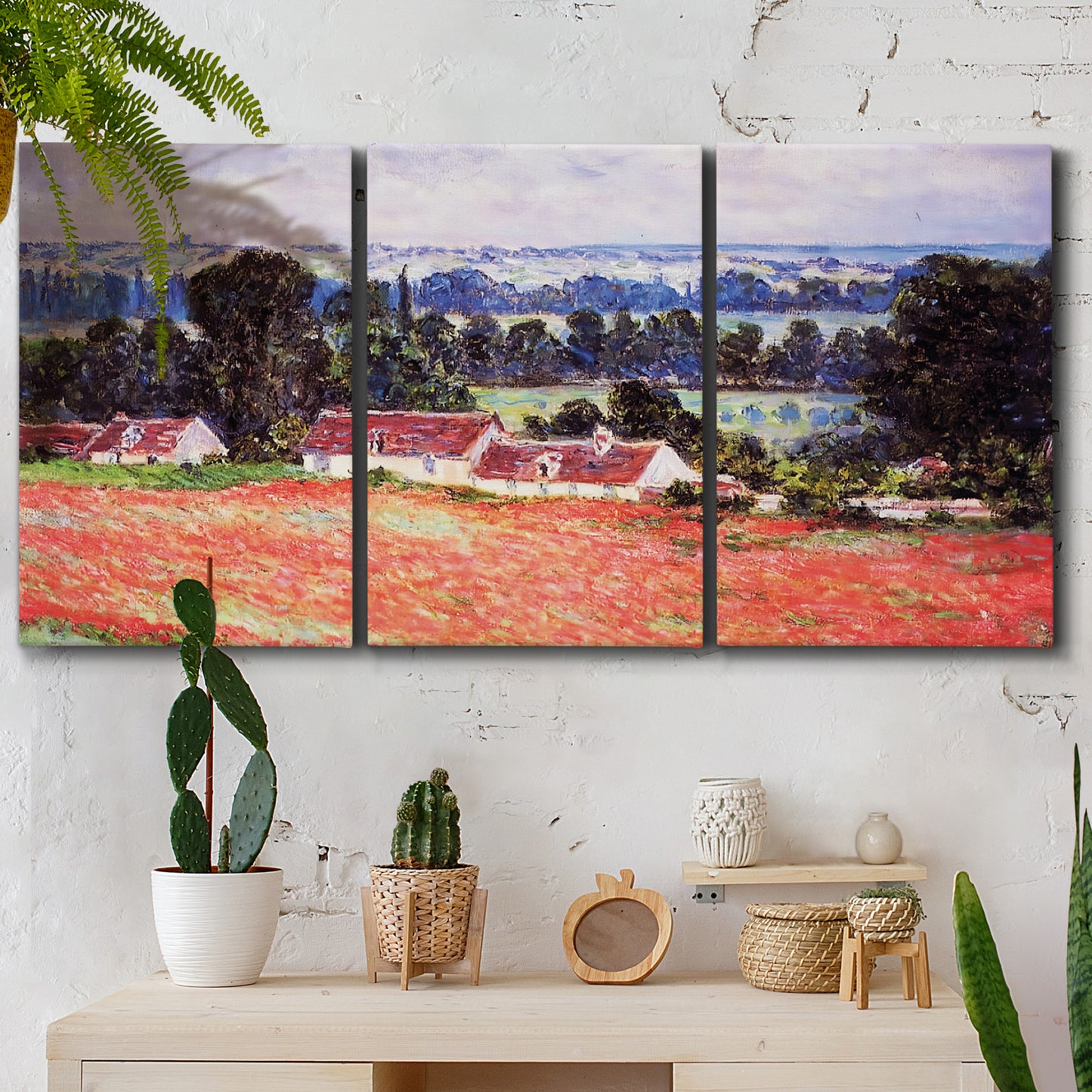Three-panel canvas wall art featuring poppy field at giverny in bloom, displayed in a boho-chic entryway above a console table.