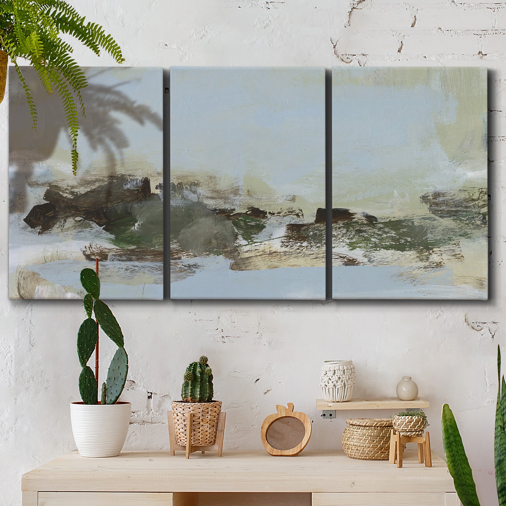 Three-panel canvas wall art featuring minimal abstract summer landscape, displayed in a boho-chic entryway above a console table.