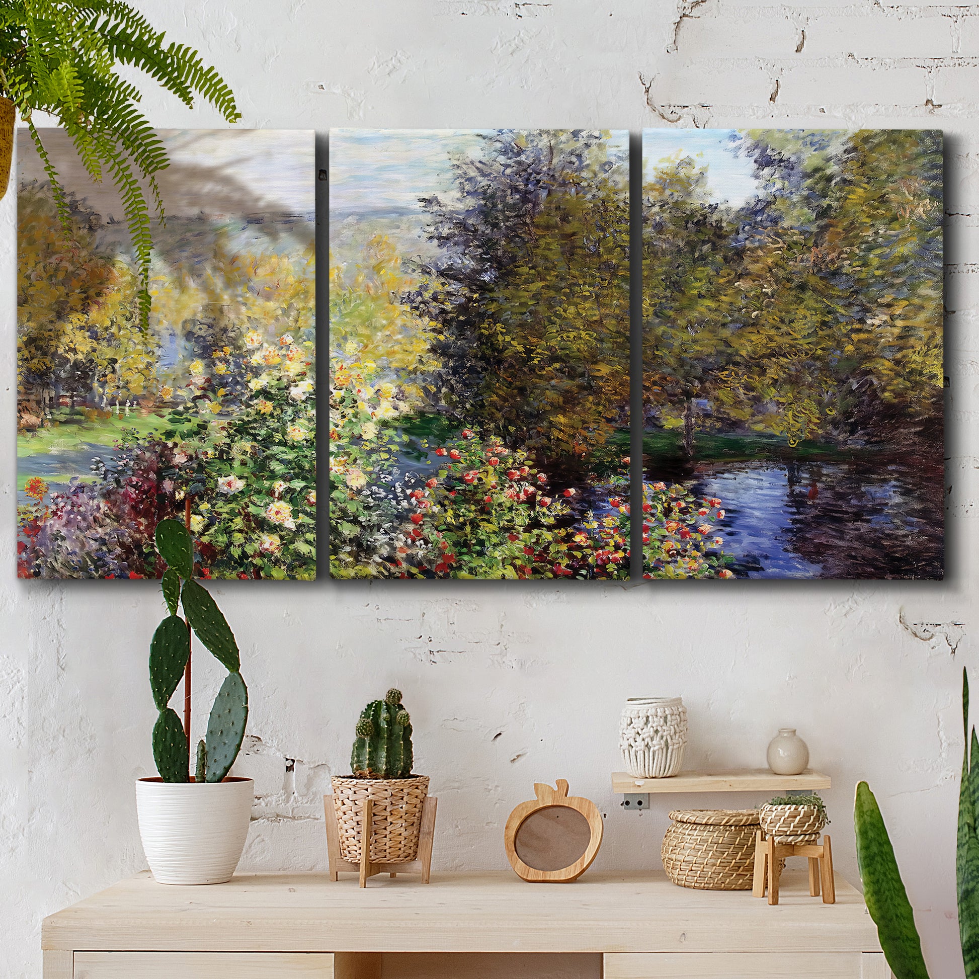 Three-panel canvas wall art featuring garden corner with flowering trees, displayed in a boho-chic entryway above a console table.