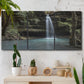 Three-panel canvas wall art featuring waterfall cascading through forest, displayed in a boho-chic entryway above a console table.