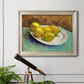 Impressionist still life with lemons by Vincent van Gogh in an ornate champagne frame displayed in a light-toned interior setting.