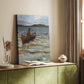 Canvas art print of a tranquil seascape with a lone figure rowing across still water styled in a home decor setting.