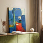 Canvas art print of a stylized building entrance with vivid tones and clean lines styled in a home decor setting.