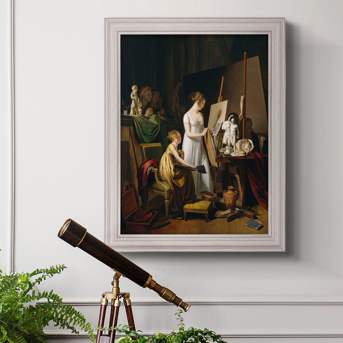Classical interior painting of an artist at work by Louis-Leopold Boilly in an ornate weathered white frame displayed in a light-toned interior setting.