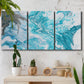 Three-panel canvas wall art featuring rocky coastal tide pool scene, displayed in a boho-chic entryway above a console table.