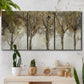 Three-panel canvas wall art featuring sunlight filtering through trees, displayed in a boho-chic entryway above a console table.