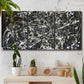 Three-panel canvas wall art featuring energetic expressionist abstract splatter, displayed in a boho-chic entryway above a console table.