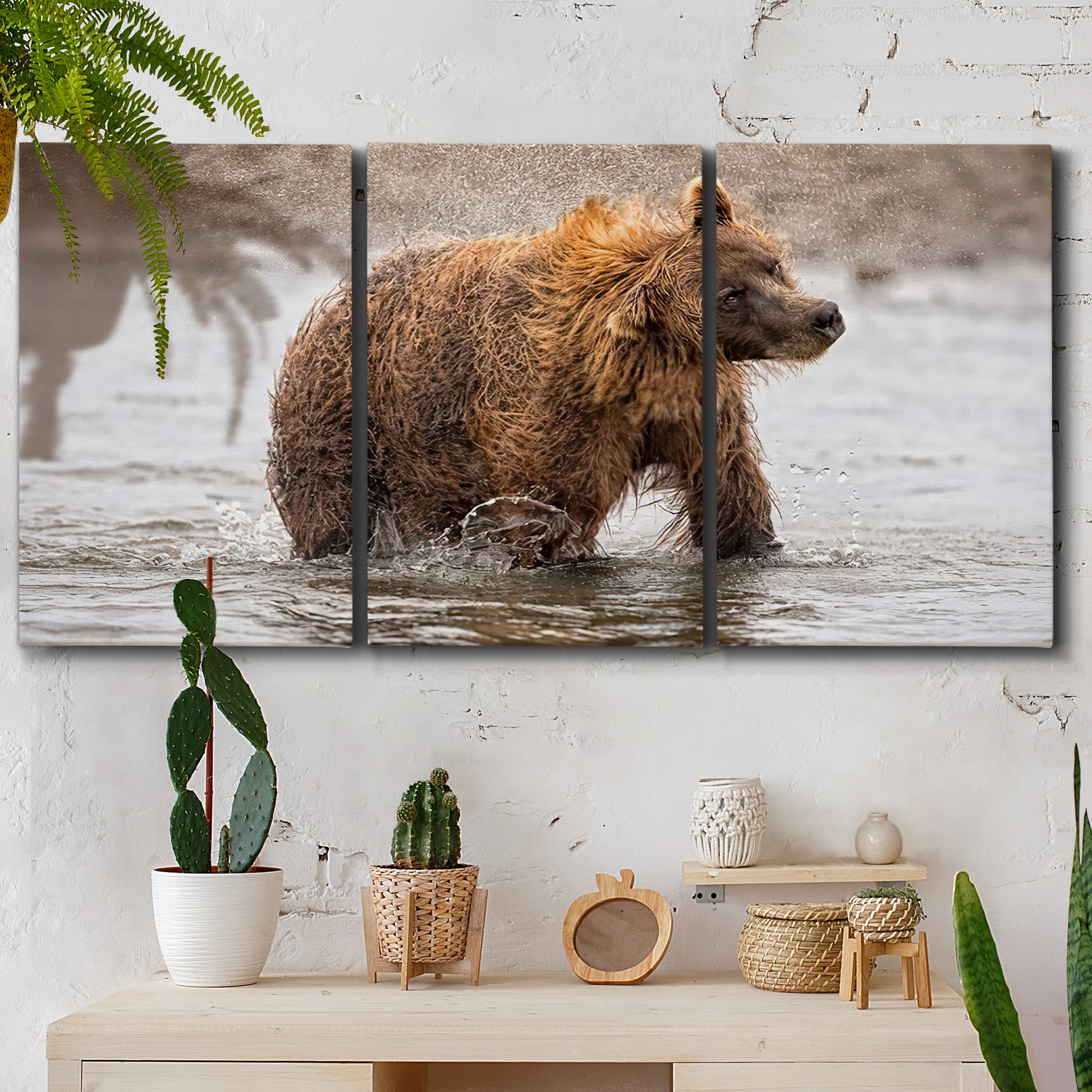 Three-panel canvas wall art featuring wildlife photography animal portrait, displayed in a boho-chic entryway above a console table.