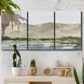 Three-panel canvas wall art featuring desert mountain landscape watercolor, displayed in a boho-chic entryway above a console table.