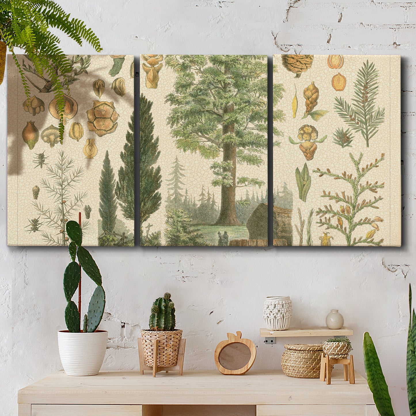 Three-panel canvas wall art featuring vintage floral botanical collage, displayed in a boho-chic entryway above a console table.