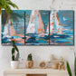 Three-panel canvas wall art featuring graphic pop style sailboats, displayed in a boho-chic entryway above a console table.