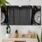 Three-panel canvas wall art featuring vintage car grille detail, displayed in a boho-chic entryway above a console table.