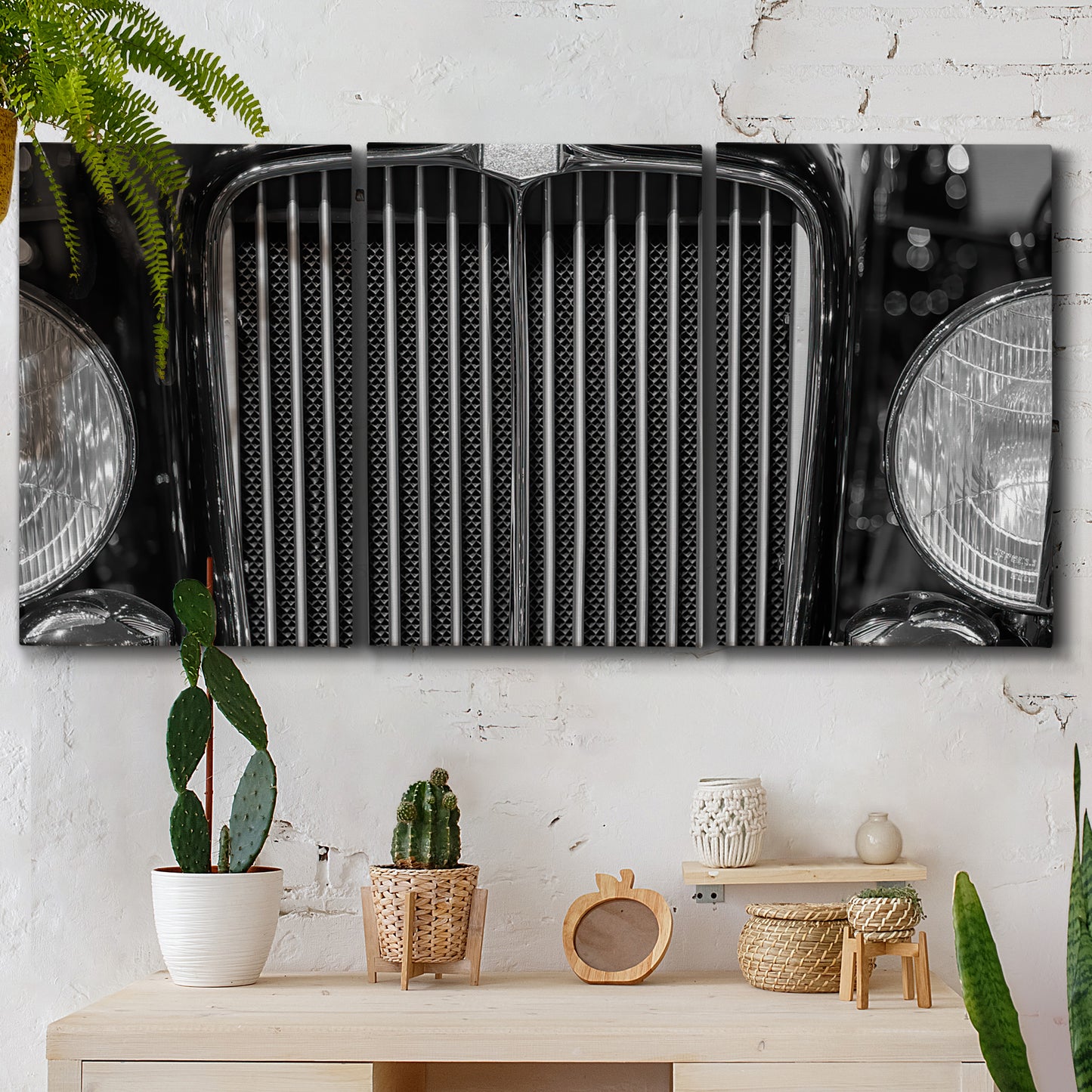 Three-panel canvas wall art featuring vintage car grille detail, displayed in a boho-chic entryway above a console table.