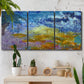 Three-panel canvas wall art featuring expressive abstract with layered color, displayed in a boho-chic entryway above a console table.