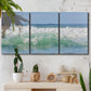 Three-panel canvas wall art featuring coastal waves breaking ashore, displayed in a boho-chic entryway above a console table.