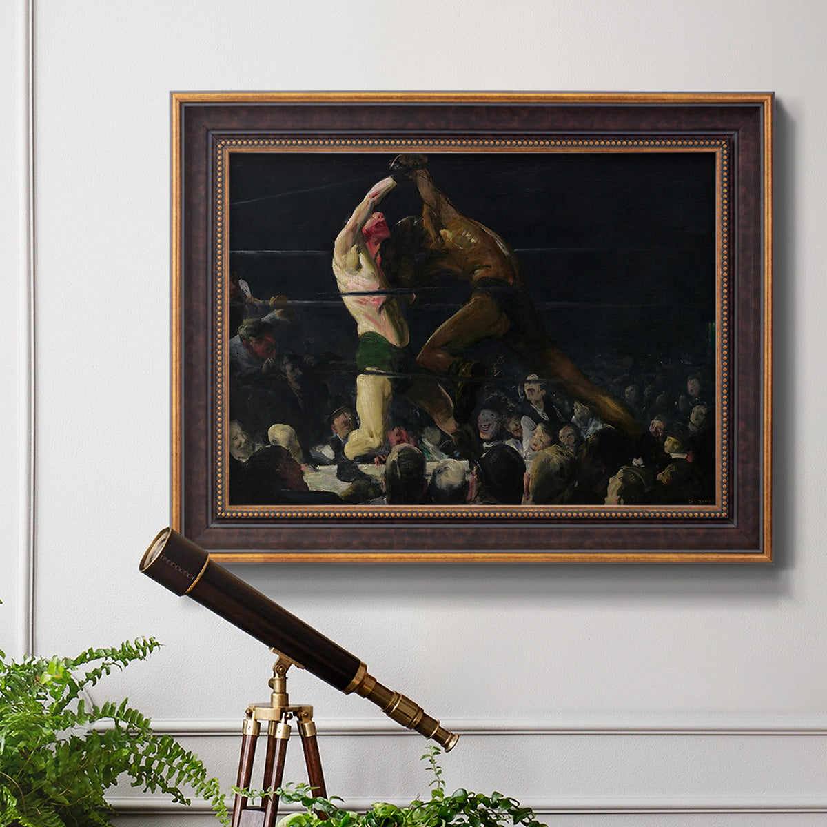 American genre painting of men in a social club by George Bellows in an ornate bronzed mahogany wood frame displayed in a light-toned interior setting.