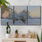 Three-panel canvas wall art featuring animals among snowy woodland trees, displayed in a boho-chic entryway above a console table.