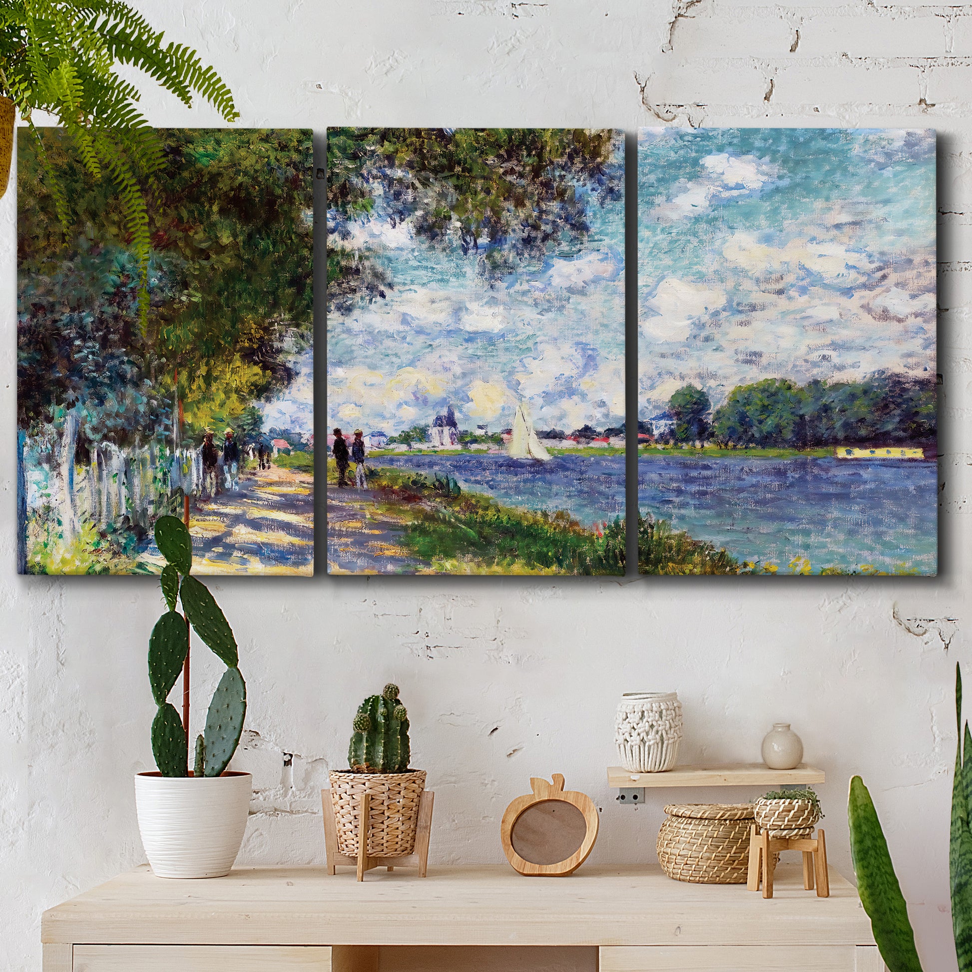 Three-panel canvas wall art featuring river landscape with boats, displayed in a boho-chic entryway above a console table.
