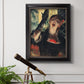 Impressionist portrait of a café singer by Edgar Degas in an ornate black frame with gilded inner detail displayed in a light-toned interior setting.
