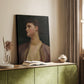 Canvas art print of a refined female figure with smooth tones and delicate features styled in a home decor setting.