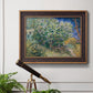 Impressionist lilac flower painting by Vincent van Gogh in an ornate bronzed mahogany wood frame displayed in a light-toned interior setting.