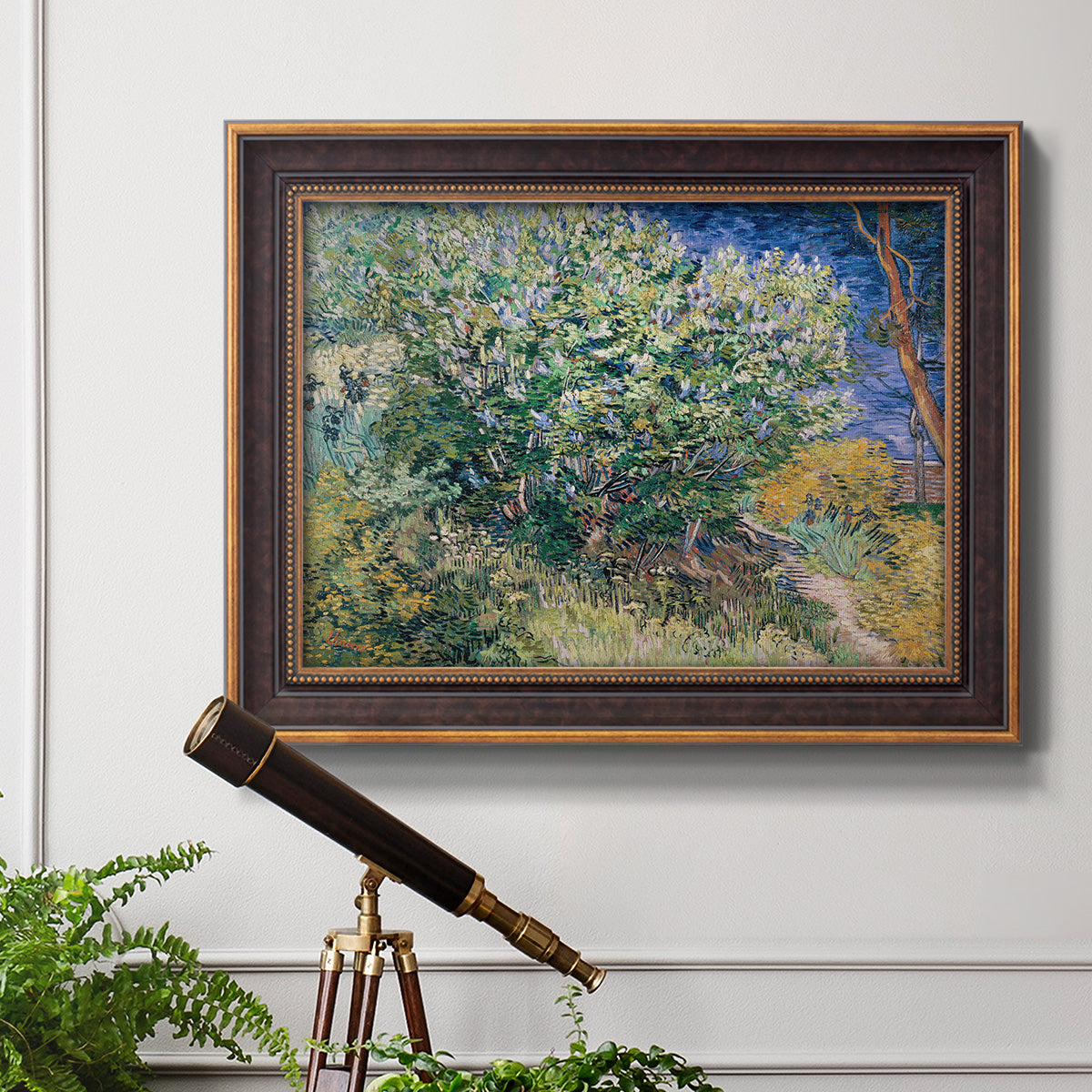 Impressionist lilac flower painting by Vincent van Gogh in an ornate bronzed mahogany wood frame displayed in a light-toned interior setting.