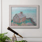 Impressionist coastal building landscape by Claude Monet in an ornate weathered white frame displayed in a light-toned interior setting.