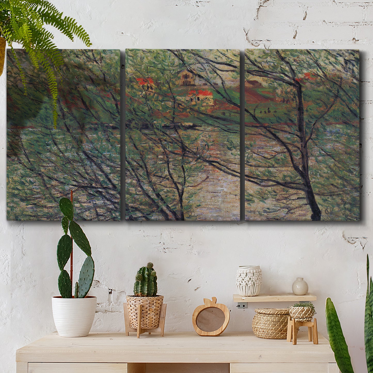 Three-panel canvas wall art featuring spring countryside with fresh foliage, displayed in a boho-chic entryway above a console table.