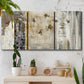 Three-panel canvas wall art featuring abstract willow inspired vertical forms, displayed in a boho-chic entryway above a console table.