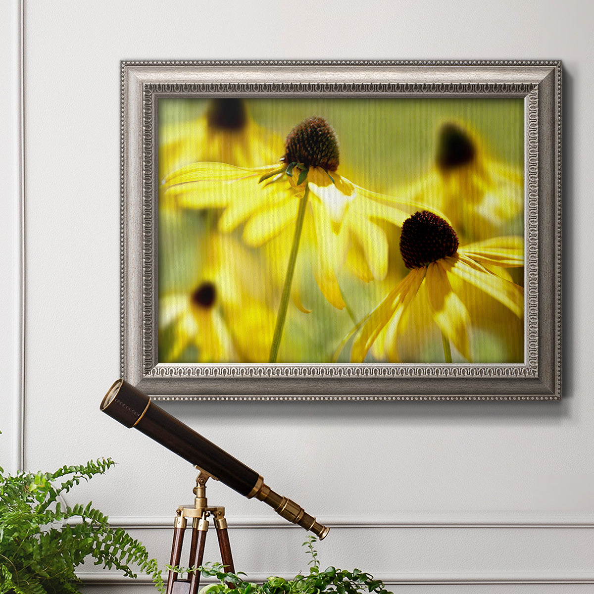 Modern floral Susan flower photography in an ornate vintage silver frame displayed in a light-toned interior setting.