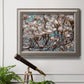 Contemporary dogwood blossom floral photography in an ornate vintage silver frame displayed in a light-toned interior setting.