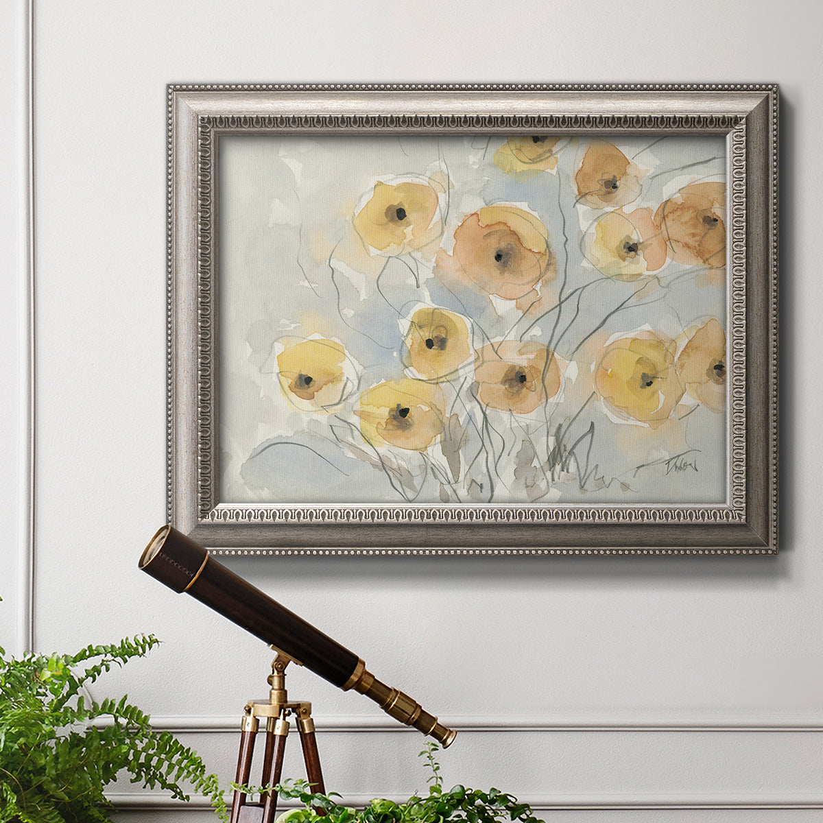 Minimalist poppy flower watercolor artwork in an ornate vintage silver frame displayed in a light-toned interior setting.