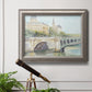 Classical watercolor painting of a French bridge in an ornate vintage silver frame displayed in a light-toned interior setting.