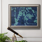 Industrial abstract botanical in an ornate vintage silver frame displayed in a light-toned interior setting.
