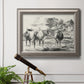 Classical rural landscape artwork by Nicolas Berchem in an ornate vintage silver frame displayed in a light-toned interior setting.