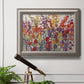 Impressionist floral bouquet artwork in an ornate vintage silver frame displayed in a light-toned interior setting.