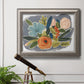 Bold modern botanical illustration in an ornate vintage silver frame displayed in a light-toned interior setting.