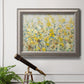 French country floral garden artwork in an ornate vintage silver frame displayed in a light-toned interior setting.