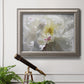 Neutral white peony photography in an ornate vintage silver frame displayed in a light-toned interior setting.