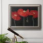 Modern red poppy floral artwork in an ornate vintage silver frame displayed in a light-toned interior setting.