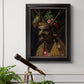 Surreal allegorical portrait representing the four seasons by Giuseppe Arcimboldo in an ornate black frame with gilded inner detail displayed in a light-toned interior setting.